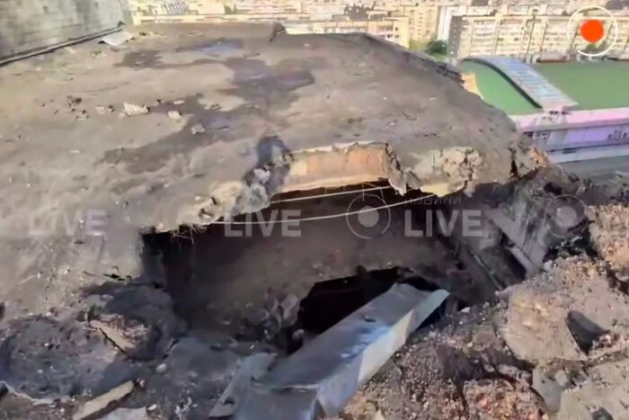 View of the destroyed roof of the 12-story building