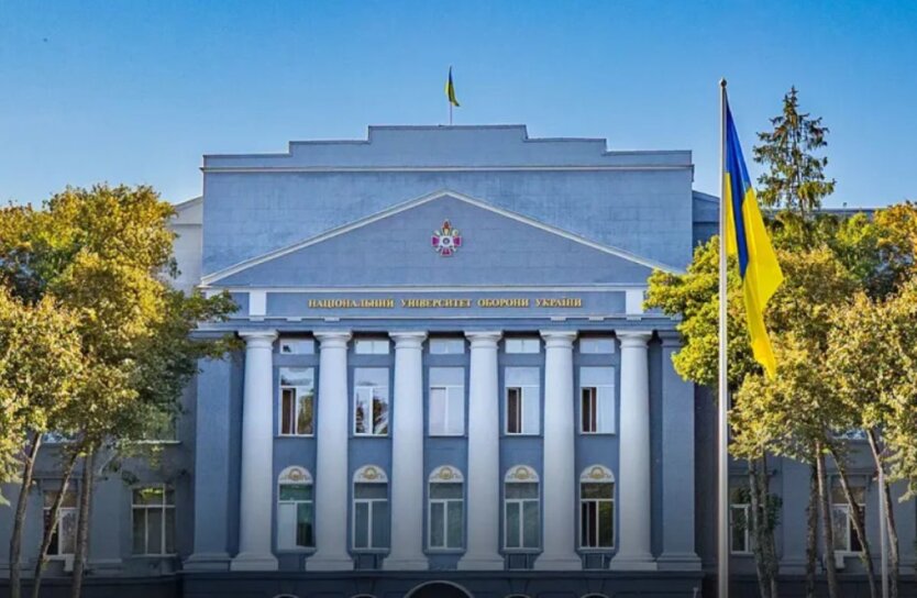 NATO logo against the background of the Ukrainian flag